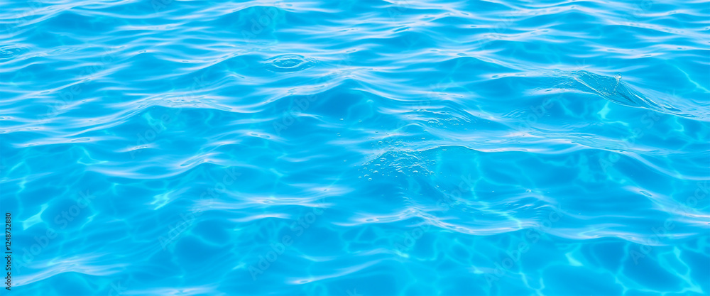 Clear blue water surface with sunlight reflections Clear blue water surface with sunlight reflections