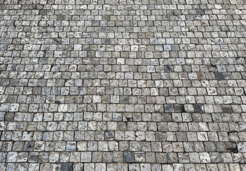 Stone paving texture, cobblestone paving background 