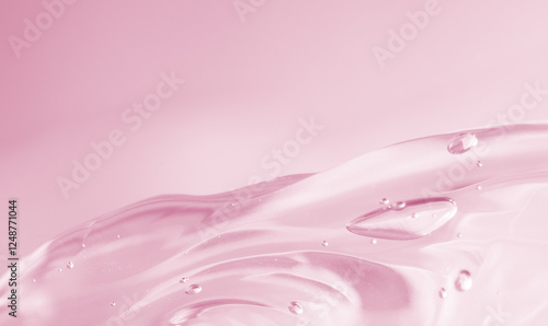 Abstract soft pink liquid with flowing texture and bubbles on a soft pastel background. Elegant and modern fluid composition. Copy space available. Background for cosmetics advertisement