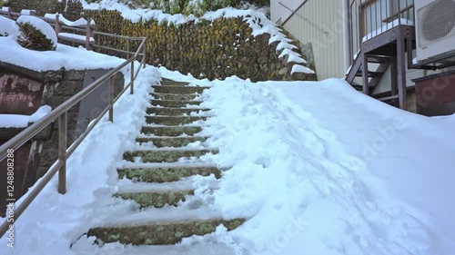 Wallpaper Mural Climbing Snow-Covered Stairs on a Cold Winter Day
 Torontodigital.ca