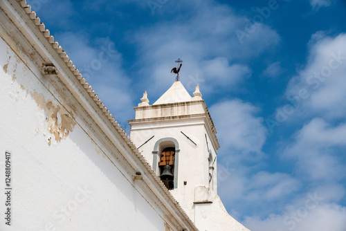 Detail of White Church Bell Tower with Weathercock photo