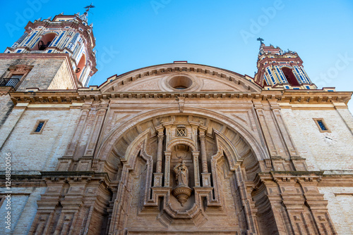 Historic Church Facade with Statue photo