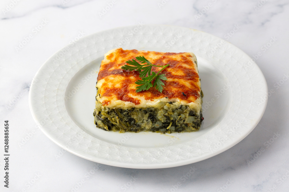Baked Spinach with cheese delicious Italian food cuisine. Spinach gratin.