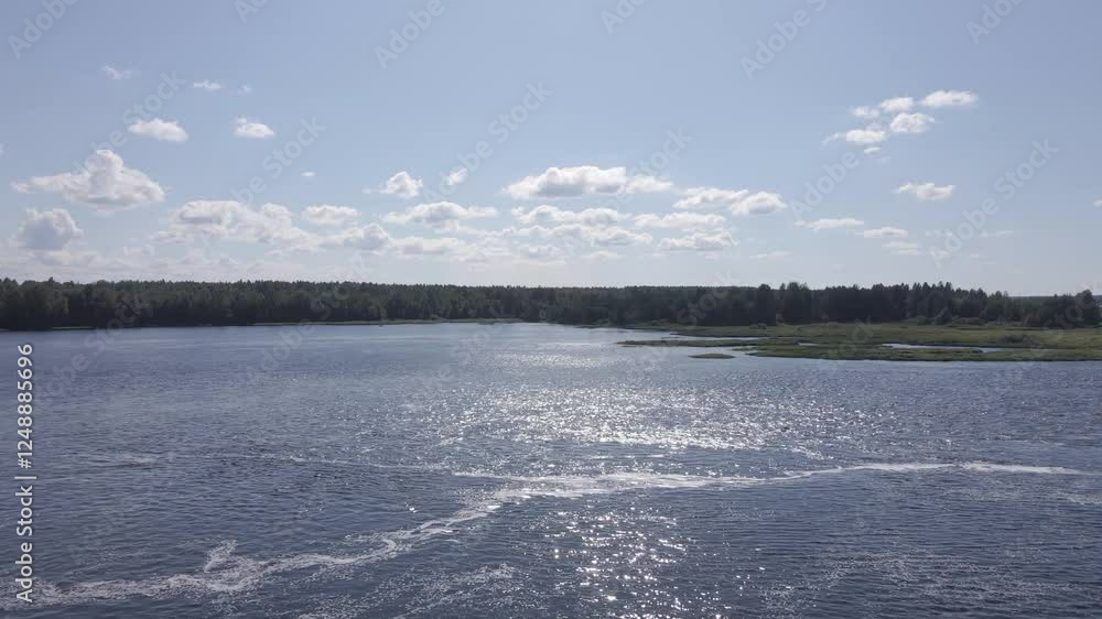 Russia, Lake Onega. View of the coast of the island in a cold lake. Beautiful nature of the Republic of Karelia. Panoramic view from the height of the Ladoga Russia, Lake Onega. View of the coast of the island in a cold lake. Beautiful nature of the Republic of Karelia. Panoramic view from the height of the Ladoga