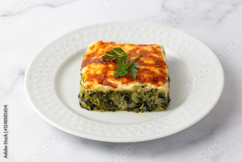 Obraz na płótnie Baked Spinach with cheese delicious Italian food cuisine. Spinach gratin. w salonie