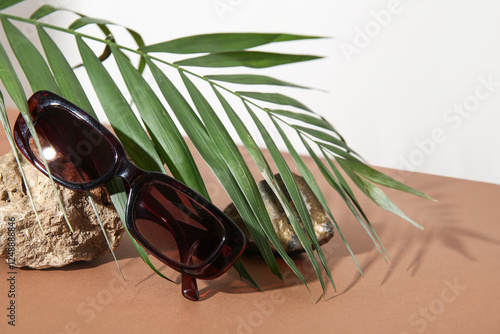 Stylish brown sunglasses wi...