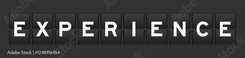Black color analog flip board with word experience on gray background
