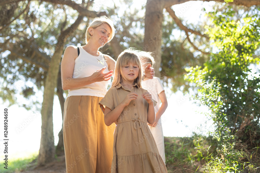 Family enjoying a sunny day in nature Family enjoying a sunny day in nature
