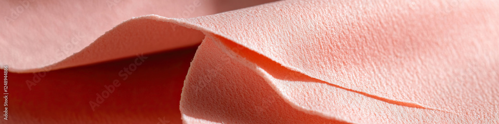 Peach-Colored Fabric Texture Close-Up Peach-Colored Fabric Texture Close-Up