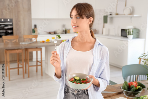 Young woman with vegetable ...