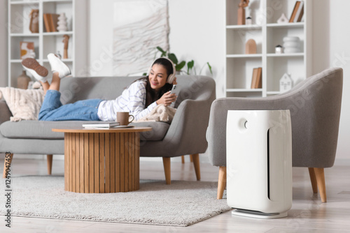 Air purifier against woman ...
