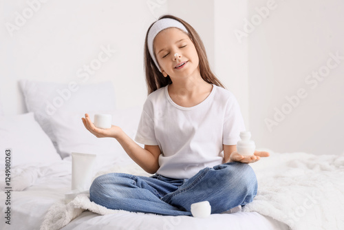 Cute little happy girl with...