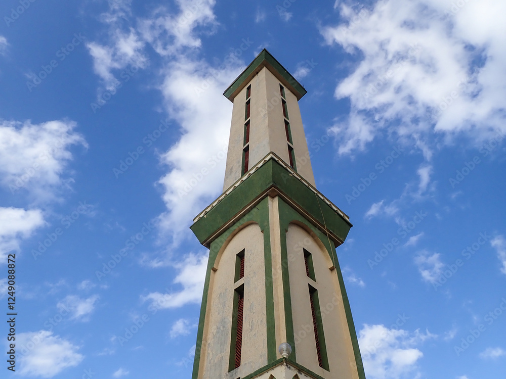 Muslim mosque for prayer and worship of Allah, Omar bin Abdul Aziz Mosque, Jijel State, Algeria, North African mosques in village on Mediterranean coast, Minaret and dome of mosque, Ramadan iftar. Muslim mosque for prayer and worship of Allah, Omar bin Abdul Aziz Mosque, Jijel State, Algeria, North African mosques in village on Mediterranean coast, Minaret and dome of mosque, Ramadan iftar.