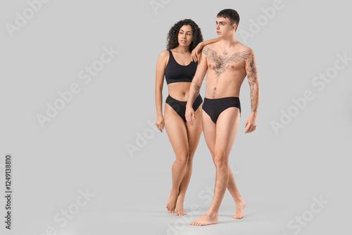 Young couple in stylish und...