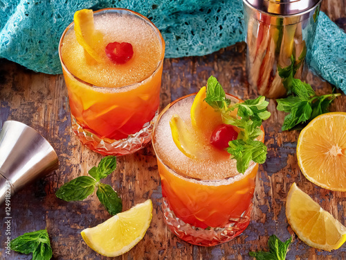 Orange cocktail on wooden underground