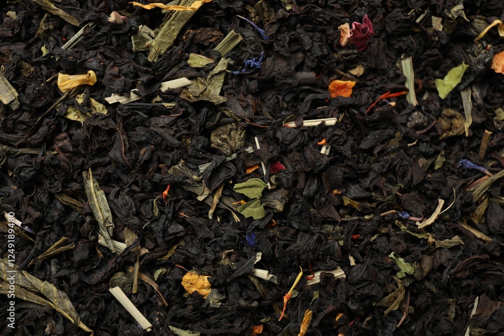 Pile of dry tea leaves as background, top view Pile of dry tea leaves as background, top view