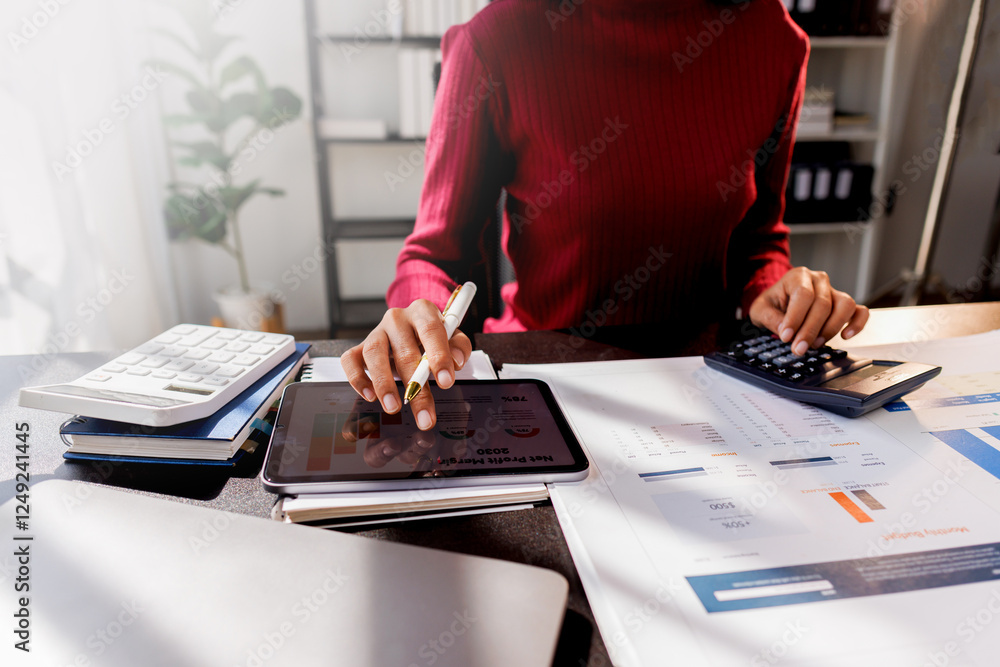 Fototapeta premium Business accountant or financial expert analyze business report graph and finance chart at corporate office. Concept of finance economy, banking business and stock market research.