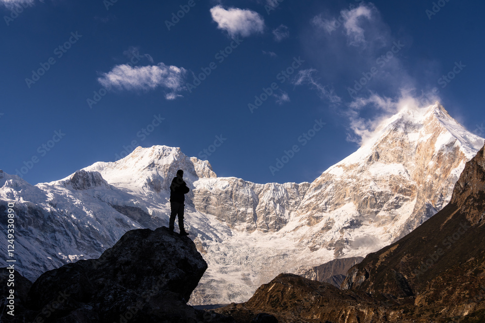 Trekker in front of Manaslu peak in Nepal