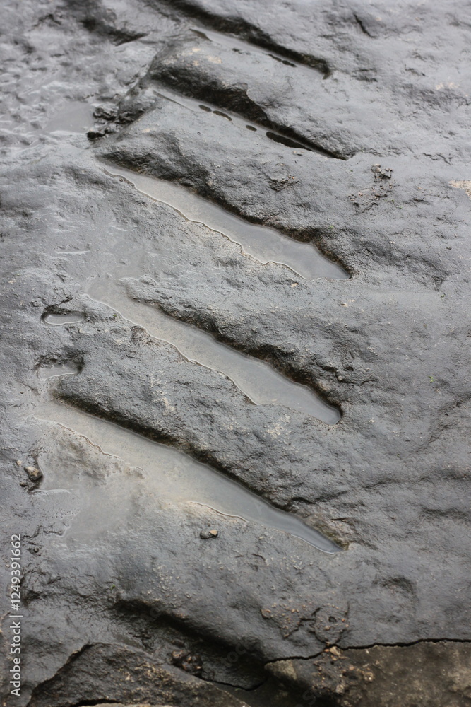 marks and scratches on an old stone wall marks and scratches on an old stone wall