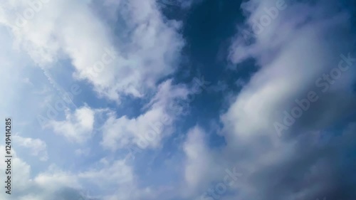 Wallpaper Mural White cumulus clouds flowing on blue sky. Nature, weather, air time lapse background Torontodigital.ca