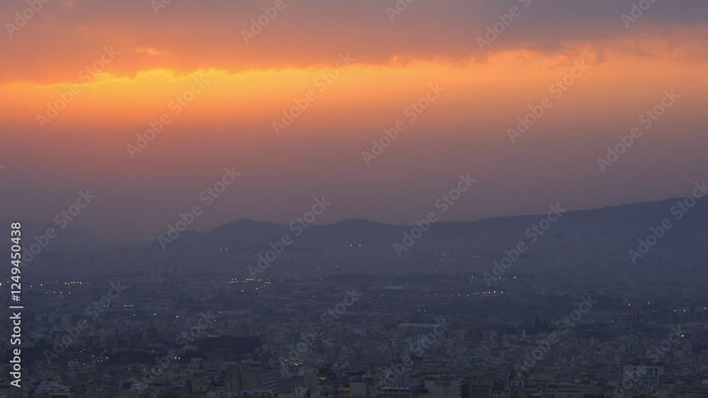 Athens city at sunset seen from Lycabettus hill viewpoint at sunset in Greece Athens city at sunset seen from Lycabettus hill viewpoint at sunset in Greece