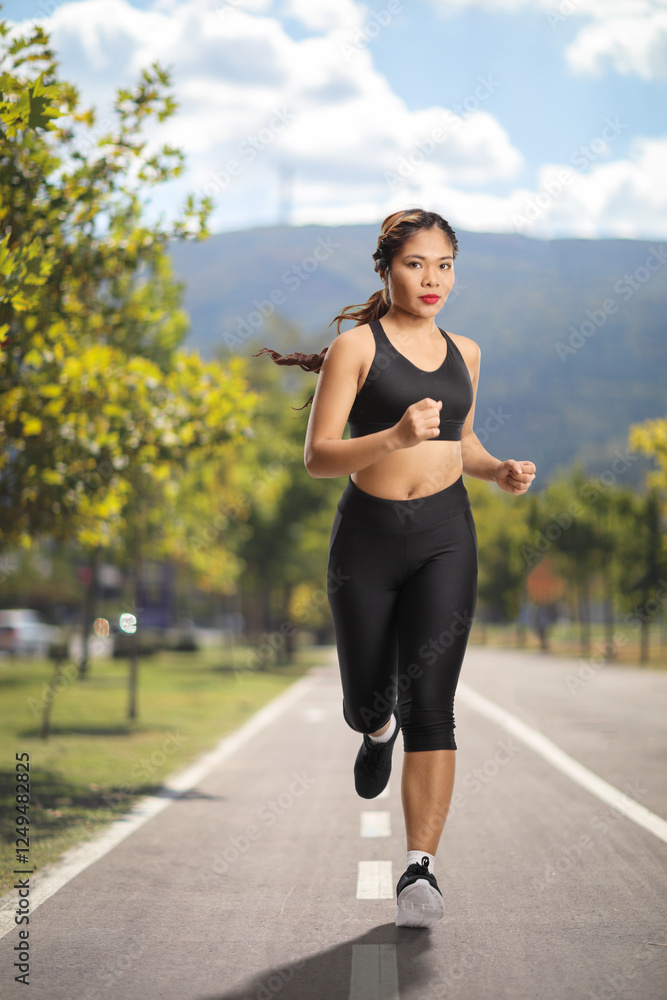 Young asian woman jogging Young asian woman jogging