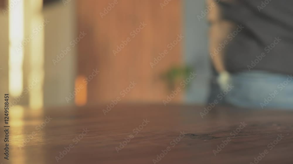 person picking up mobile phone from table showing incoming call icon,male hand picks up smartphone from wooden desk person picking up mobile phone from table showing incoming call icon,male hand picks up smartphone from wooden desk