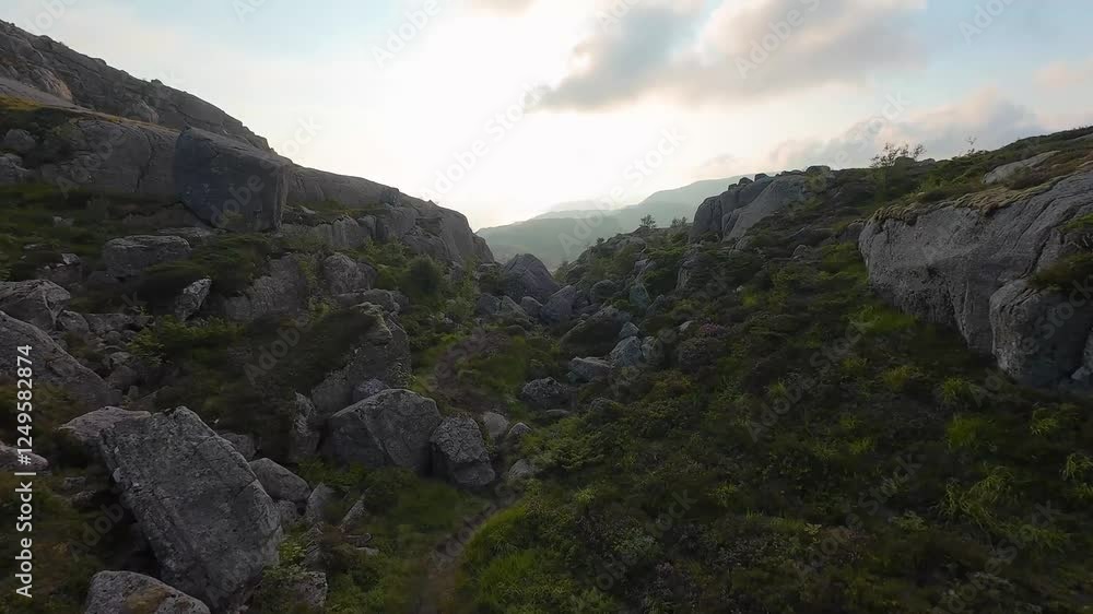 Close flight above snow mountain peaks to reveal the golden sunset, Lofoten Islands in Norway, impressive low flight. 4K Fpv drone flight. Close flight above snow mountain peaks to reveal the golden sunset, Lofoten Islands in Norway, impressive low flight. 4K Fpv drone flight.