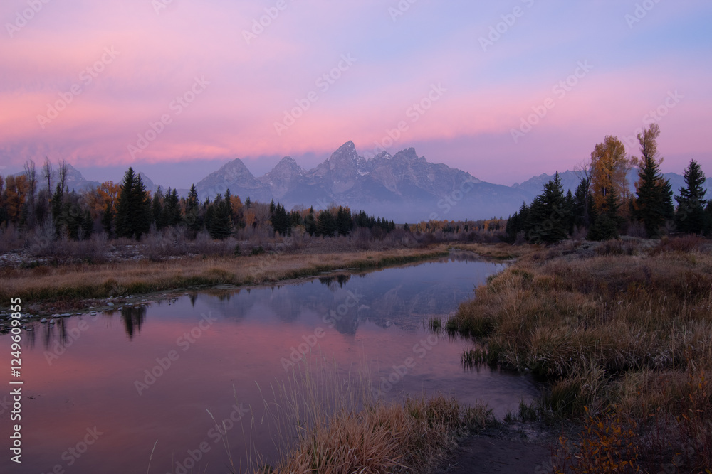 Serene Mountain Landscape with Mirror-Like Reflection of Peaks at Sunrise
Serene Mountain Landscape with Mirror-Like Reflection of Peaks at Sunrise