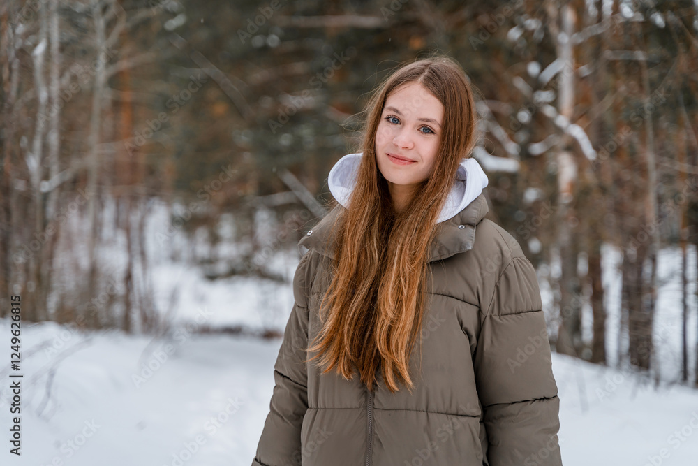 Beautiful wild young teenage woman in a hat in a frosty snowy forest, fun and youth outdoors. Beautiful wild young teenage woman in a hat in a frosty snowy forest, fun and youth outdoors.
