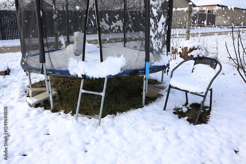 Wallpaper Mural A Snow Covered Trampoline Resting in a Beautiful Winter Landscape During the Cold Season Torontodigital.ca