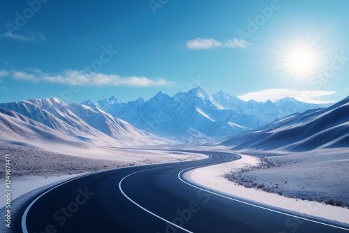 Wallpaper Mural Scenic winding road through snowy mountains - A winding road leads through a stunning snowy mountain landscape under a bright blue sky with a radiant sun. Torontodigital.ca