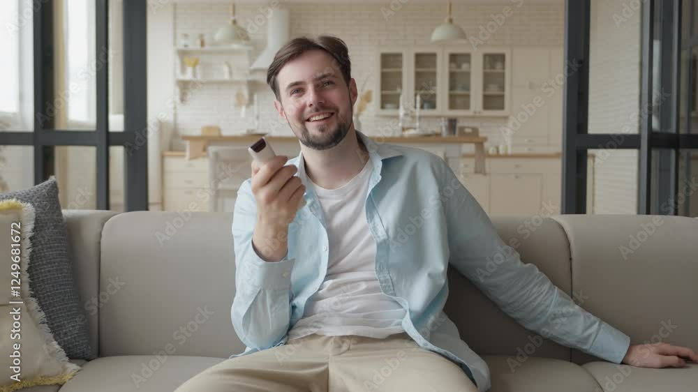 Bachelor Man Enjoy Weekends Resting Lean Sit on Comfy Sofa in Living Room Alone Bachelor Man Enjoy Weekends Resting Lean Sit on Comfy Sofa in Living Room Alone