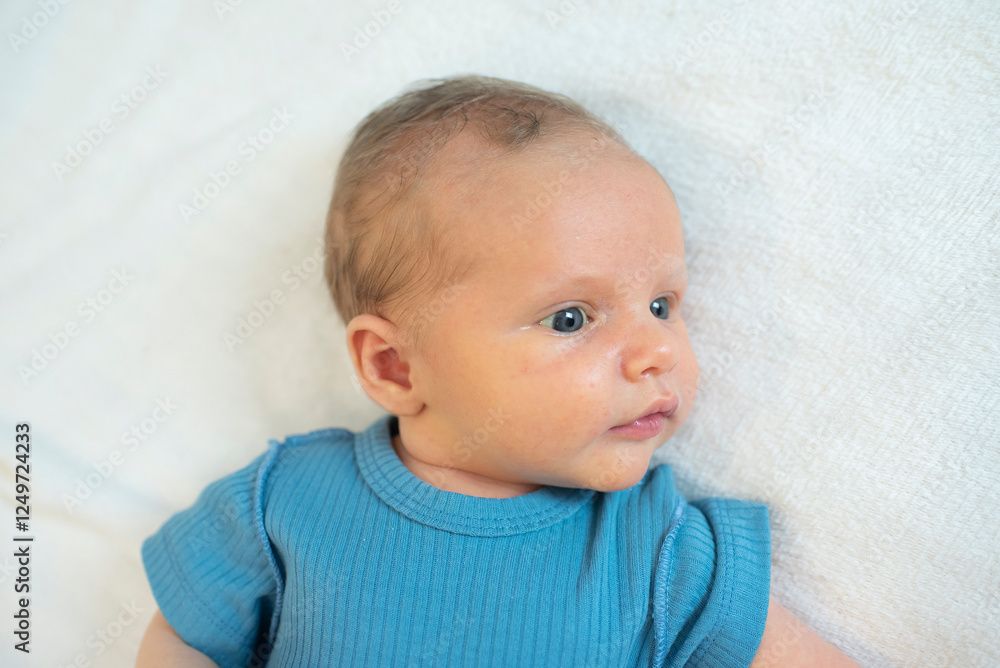 a baby boy, the child is 1 month old (30 days). a baby boy, the child is 1 month old (30 days).