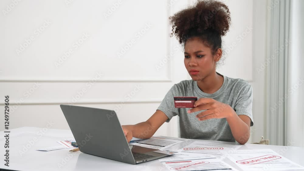 Stressed young woman has financial problems with credit card debt to pay crucial show concept of bad personal money and mortgage pay management crisis. Stressed young woman has financial problems with credit card debt to pay crucial show concept of bad personal money and mortgage pay management crisis.