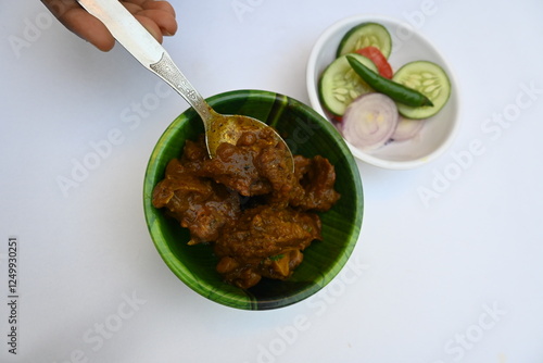 Indian Goat mutton curry in traditional style. Mutton Curry are delicious Indian mutton dishes. spicy mutton curry in Indian home. Delicious Goat meat. 
 photo