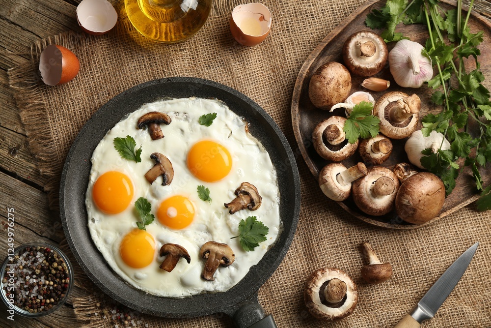 Tasty fried eggs with mushrooms and parsley served on wooden table, flat lay Tasty fried eggs with mushrooms and parsley served on wooden table, flat lay
