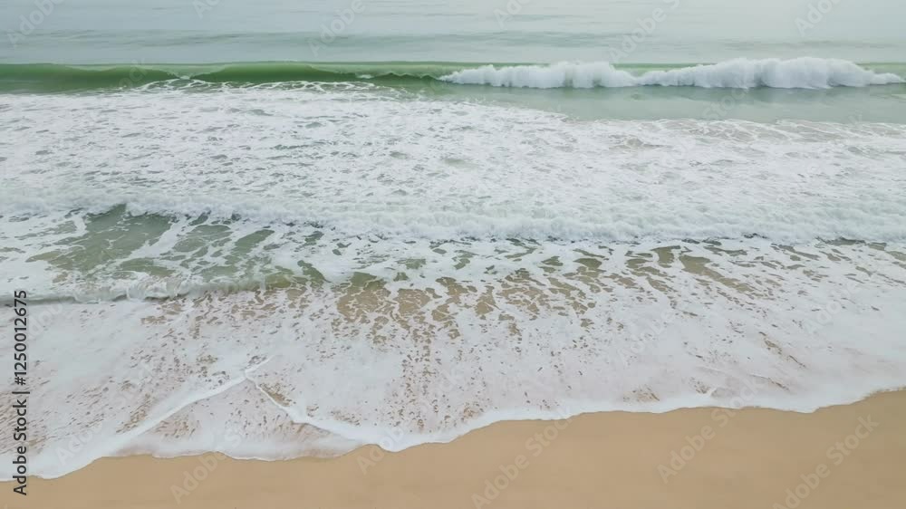 Amazing sea water and waves crashing on sandy shore,Beautiful sea nature beach background Amazing sea water and waves crashing on sandy shore,Beautiful sea nature beach background