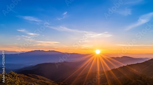Magnificent Sunset Over a Mountain Range with Radiant Sunbeams Lighting the Sky : Generative AI