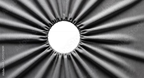 Gray fabric pulled taut with circular opening in the center
