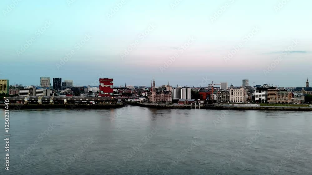 Antwerp's Skyline at Dusk Tranquil Evening Panorama Capturing the City's Architectural Diversity Reflected in the Calm Waters of the Scheldt River Antwerp's Skyline at Dusk Tranquil Evening Panorama Capturing the City's Architectural Diversity Reflected in the Calm Waters of the Scheldt River