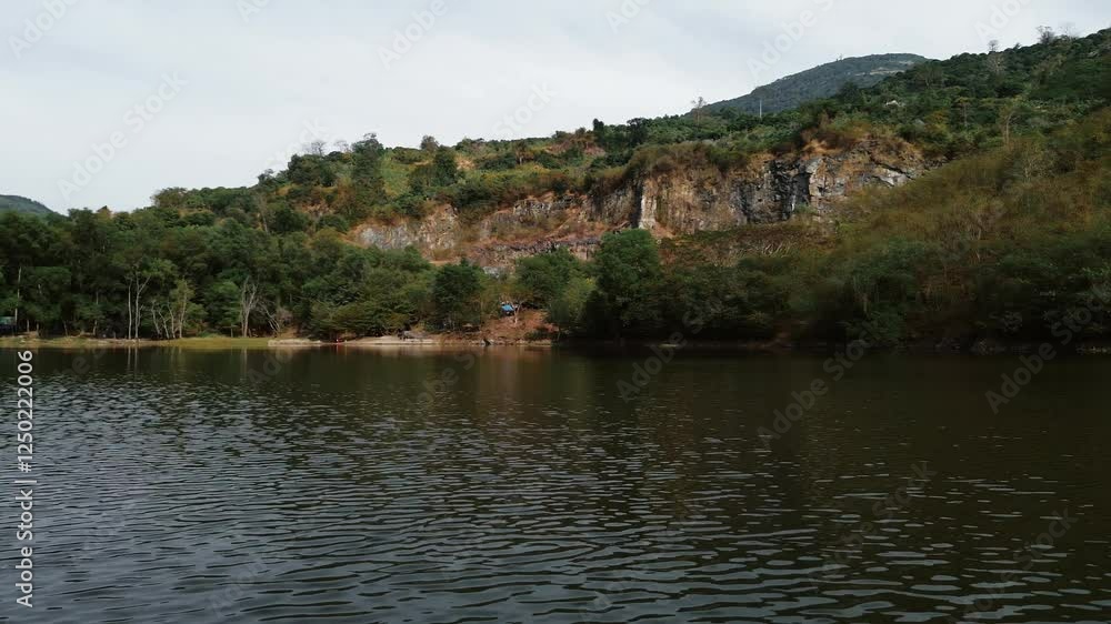 Calm and scenic landscape view of Tay Ninh, South Vietnam with a tranquil lake Calm and scenic landscape view of Tay Ninh, South Vietnam with a tranquil lake