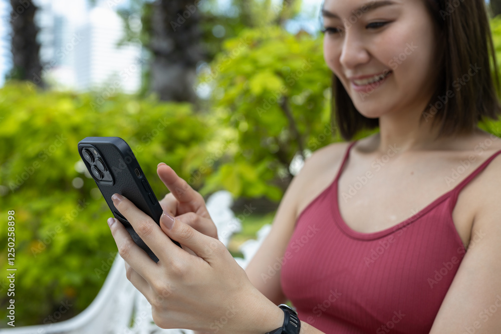 sporty woman using chat smartphone during break workout outdoor. searching online mobile phone. sporty woman using chat smartphone during break workout outdoor. searching online mobile phone.