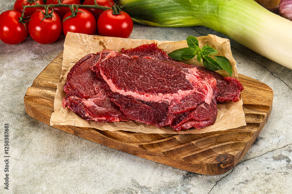 Raw beef cheeks cut for cooking Raw beef cheeks cut for cooking