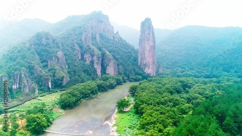 Explore the breathtaking aerial views of Zhejiang Li Jinyun Xanadu Scenic Area surrounded by lush greenery and stunning rock formations photo