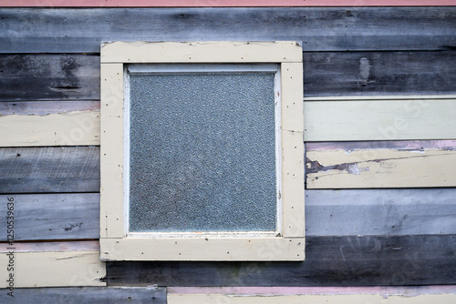 Obraz na płótnie Frosted glass in an old wooden window frame in a rundown house. w salonie