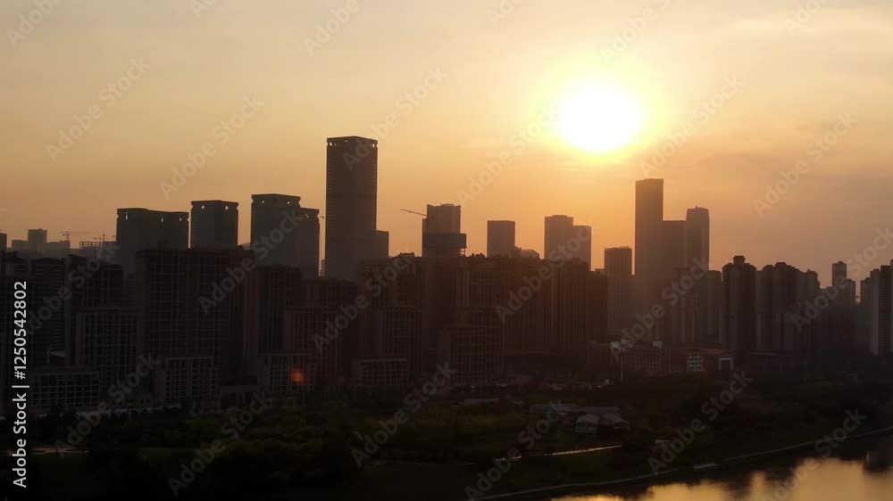 Breathtaking sunset over Nanning city showcasing Guangxi's stunning skyline with silhouettes of modern architecture Breathtaking sunset over Nanning city showcasing Guangxi's stunning skyline with silhouettes of modern architecture