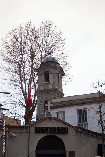 Armenian Church and tree in winter in Kadikoy in Istanbul showing the church tower and entrance photo