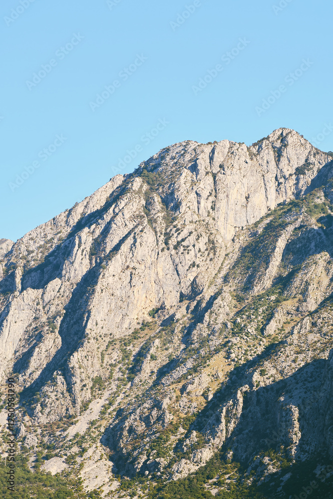 Beautiful mountain range against a clear blue sky Beautiful mountain range against a clear blue sky