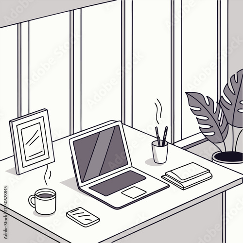 Modern office workspace setup with laptop, coffee cup, and stationery